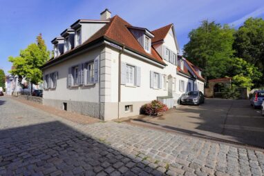 Außergewöhnliches 3-Familienhaus direkt am Stadtgarten – Wohnen und Vermieten unter einem Dach!